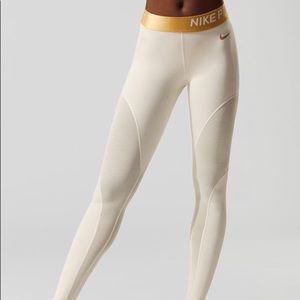 white and gold nike leggings
